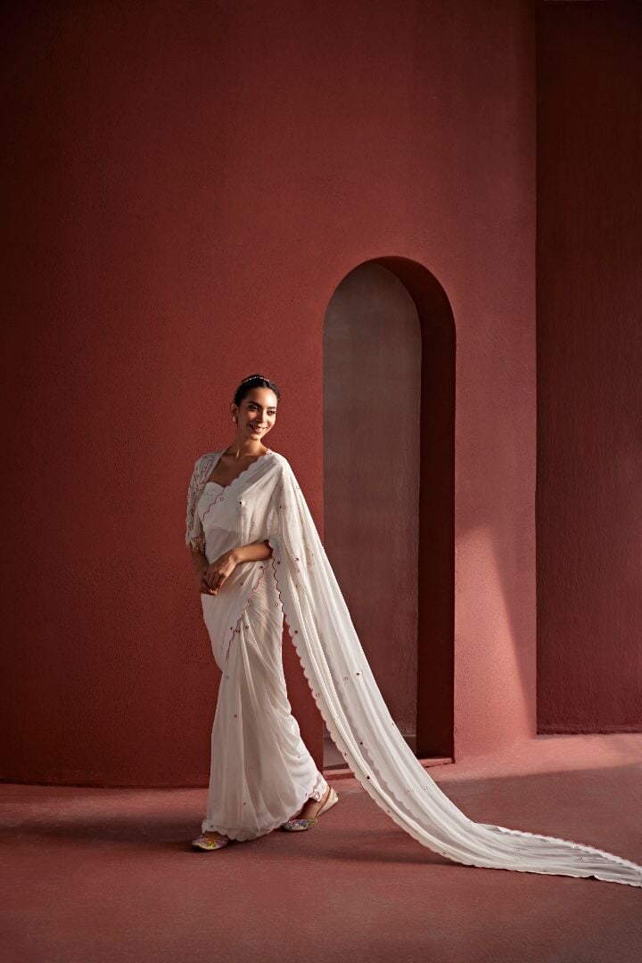 9 nazakat Saris & Lehengas TariniVij