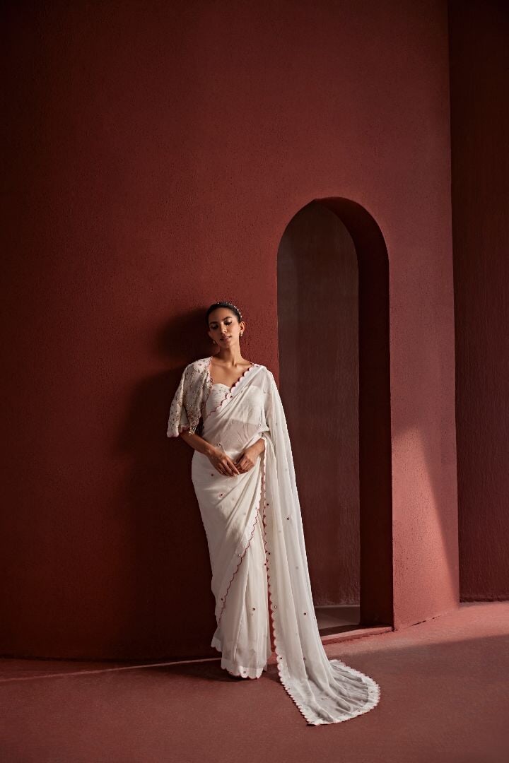 9 nazakat Saris & Lehengas TariniVij