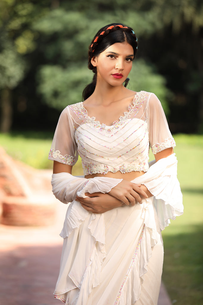 Snow white Saris & Lehengas TariniVij