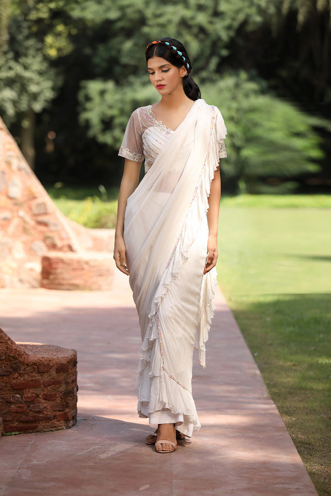 Snow white Saris & Lehengas TariniVij