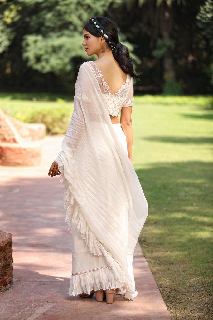 Snow white Saris & Lehengas TariniVij