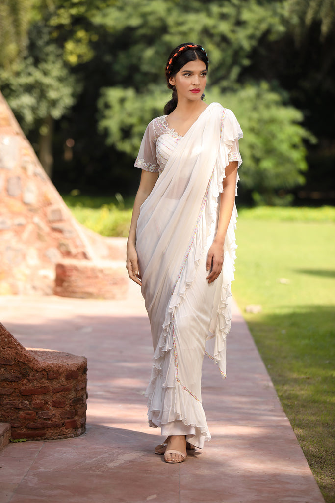Snow white Saris & Lehengas TariniVij