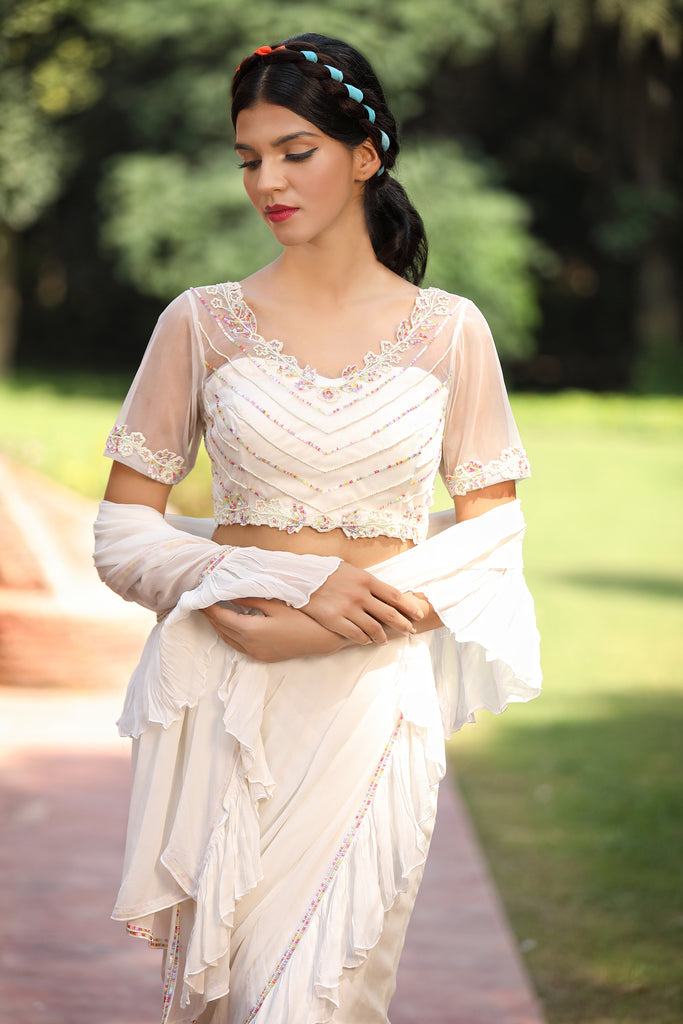 Snow white Saris & Lehengas TariniVij 